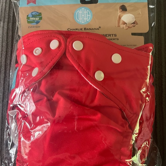 Baby reusable diapers and liners, wash clothes, diaper bag, changing pad. - Picture 7 of 8